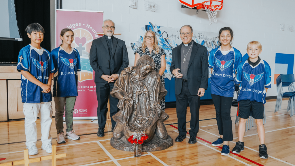 St. Juan Diego School students, Principal, Father Gerard Monaghan and Archbishop Marcel Damphousse